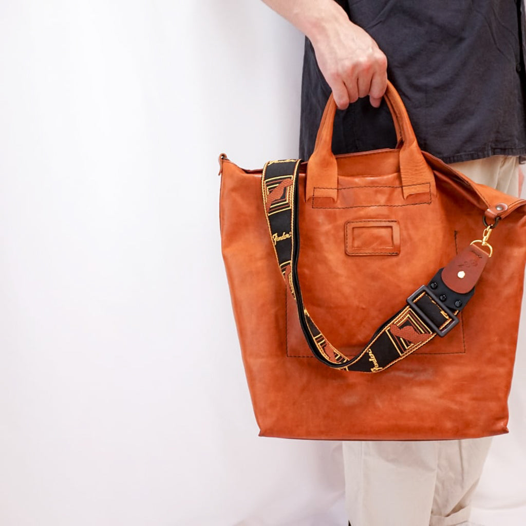 Backstage for Bag | An attachment that transforms a guitar strap into a shoulder bag strap