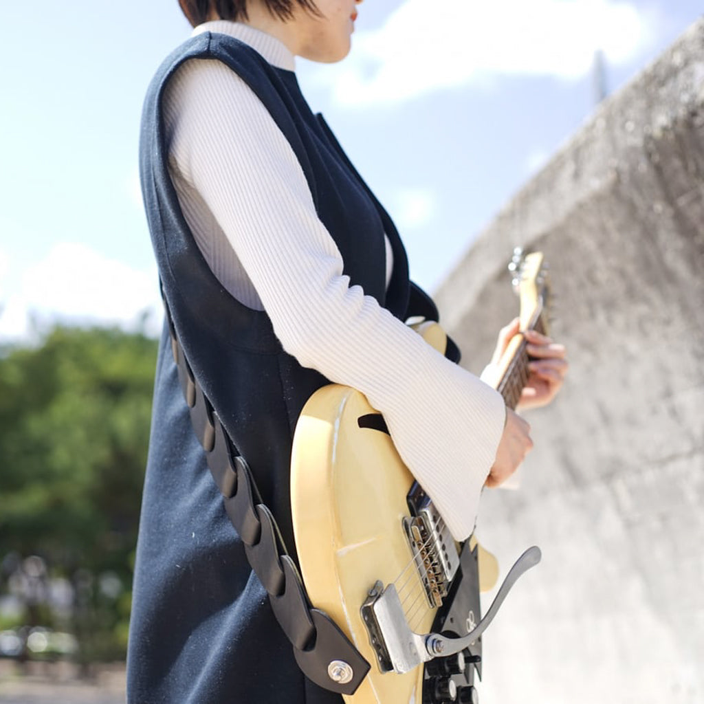 folklore | Guitar strap that looks like scales